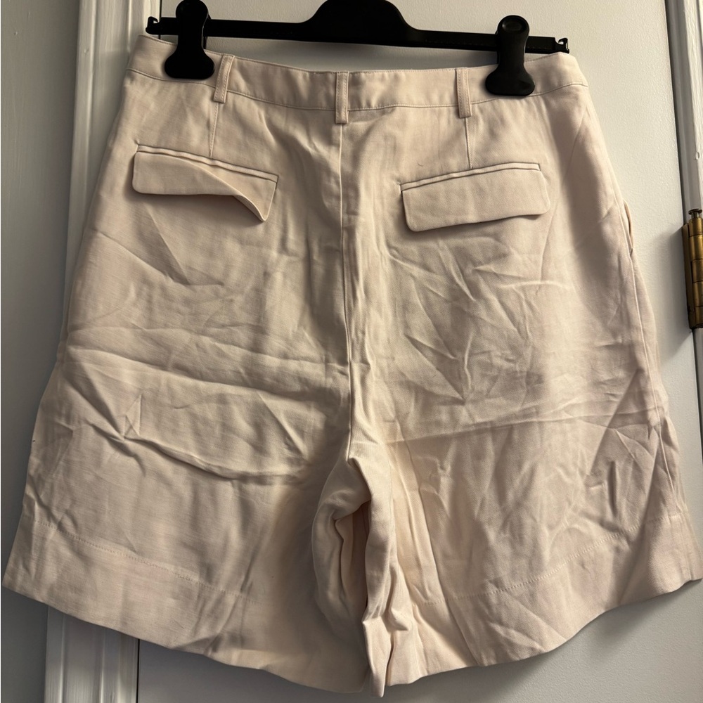 Tuckernuck Women's Pleated Shorts in Light Cream - Picture 2 of 3
